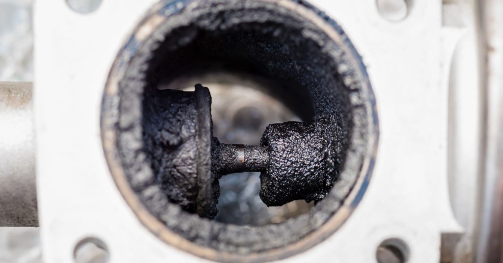 The inside of an engine where the engine oil has turned to sludge because the owner failed to get Albuquerque oil changes regularly. 