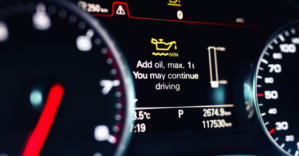 An engine oil sensor on a vehicle's dash advises the driver it's time for an Albuquerque oil change. 