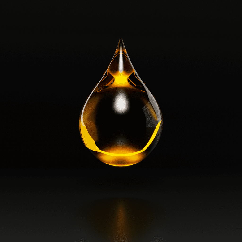 Engine oils when fresh look amber in color like this oil droplet.